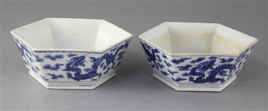 A pair of Chinese blue and white dragon hexagonal bowls, early 20th century, 18.5cm wide